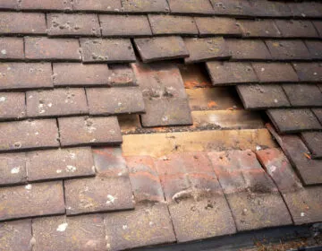 broken roof tiles in need of roof repair in Finchley